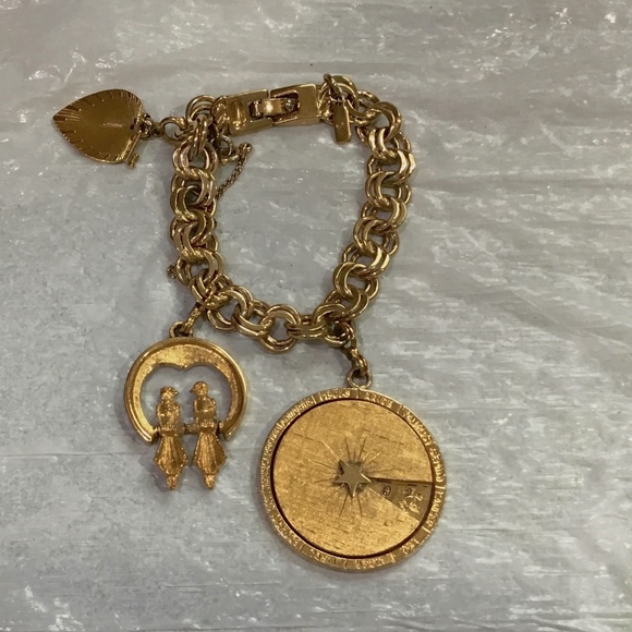 Monet vintage gold tone chain charm bracelet with Zodiac signs